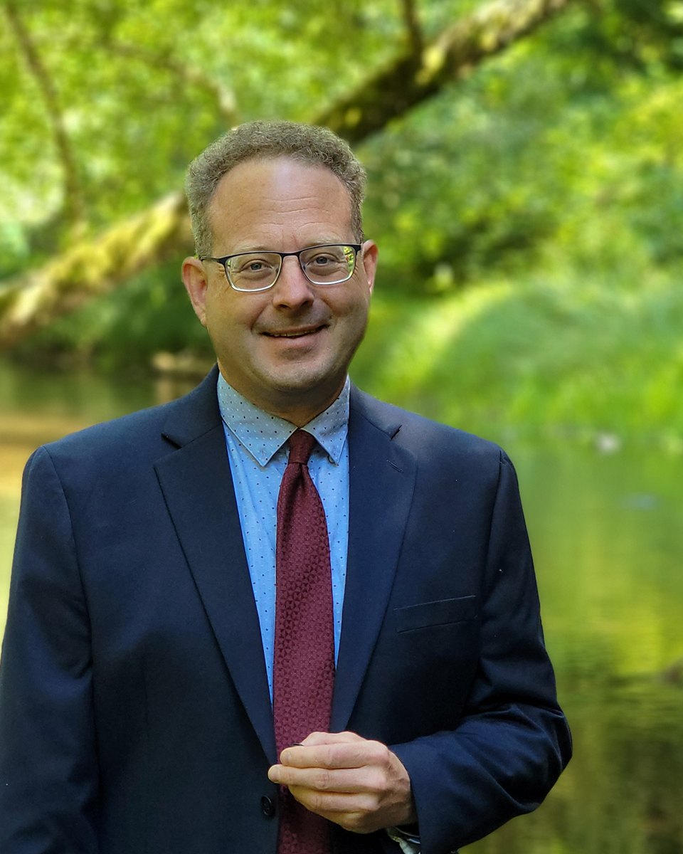 Matt Fadich, founder of inSpark, beside a river in the Pacific Northwest